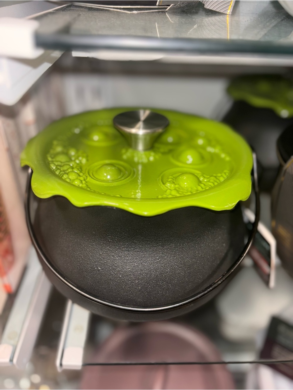 Viral black cauldron Dutch oven with green lid Smith Clark 6 quart